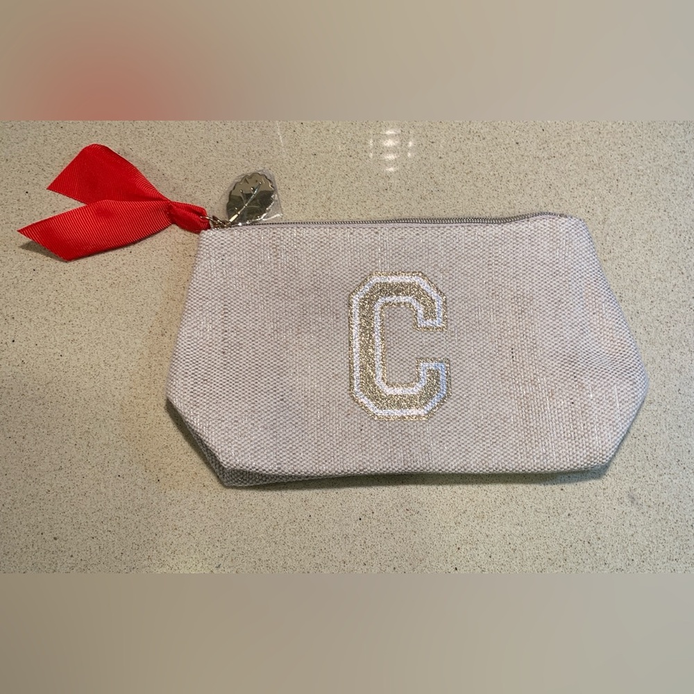 NWT CLAIRINS Stylish Cream Clutch with Gold & Silver Accents